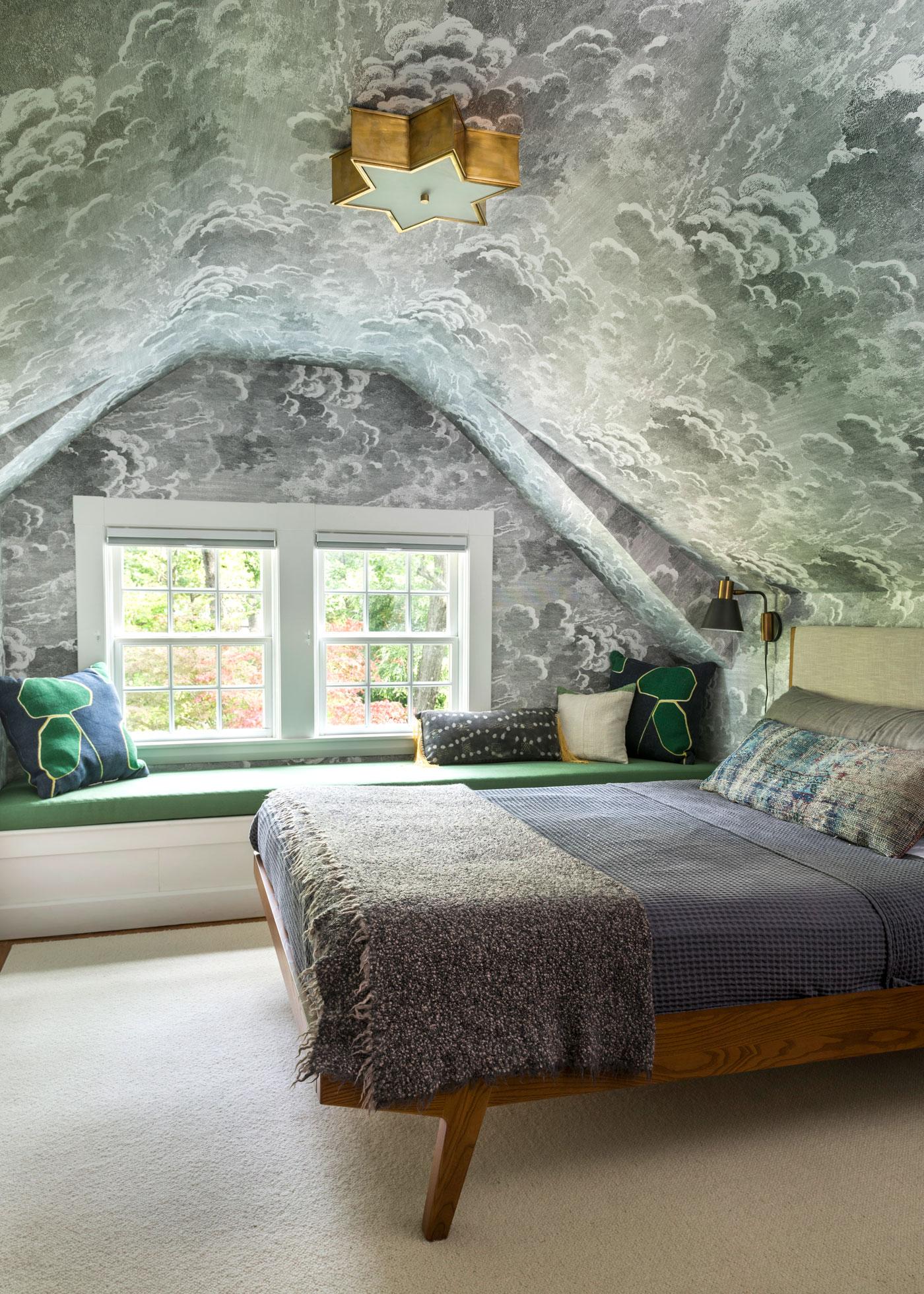 Bedroom with ceiling wallpaper based on a Moroccan tile roof